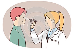 Female doctor examine male patient sight