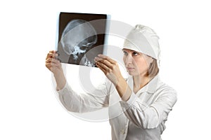 Female doctor examing an x-ray