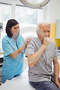 Female doctor examining a patient