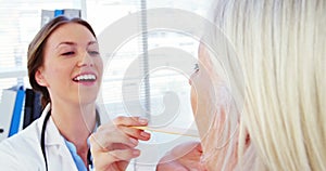 Female doctor examining a patient