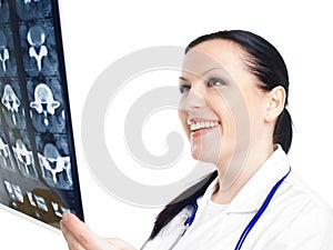 Female doctor examining x-ray picture