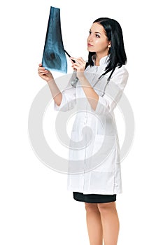 Female doctor examining an x-ray picture