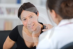 Female doctor explaining to female patient