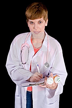 Female doctor filling out prescription orders