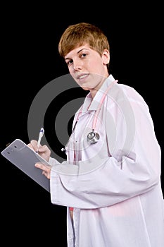 Female doctor filling out prescription orders