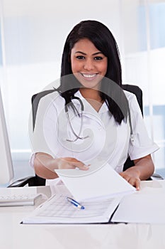 Female doctor giving medical report