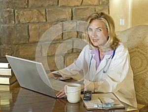 Female Doctor at her desk working on computer