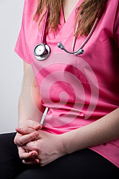 Female doctor with her stethoscope around her neck.