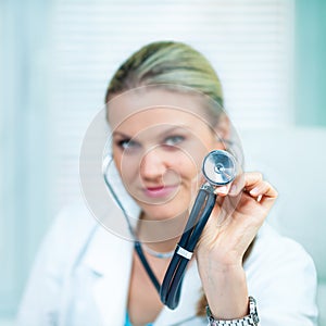 Female Doctor Is Holding a Black Stethoscope
