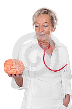 Female doctor is holding an brain