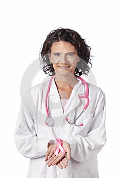 Female doctor holding breast cancer ribbon