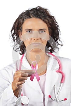 Female doctor holding breast cancer ribbon