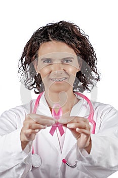 Female doctor holding breast cancer ribbon