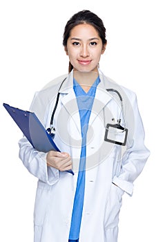 Female doctor holding clipboard