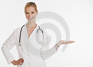 Female doctor holding copyspace