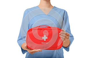 Female doctor holding first aid kit on white background, closeup.
