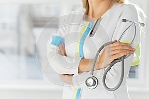 Female doctor holding stethoscope