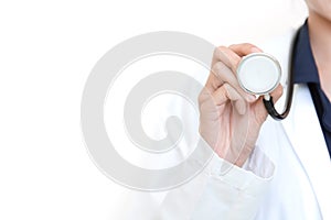 Female Doctor holding stethoscope medical equipment tool on whit