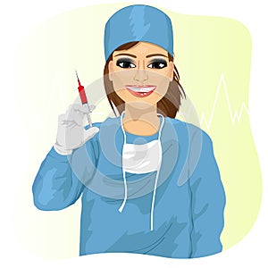 Female doctor holding a syringe