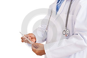 Female doctor holding thermometer with stethoscope.