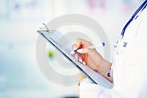 Female doctor holds blank prescription document. office Hospital