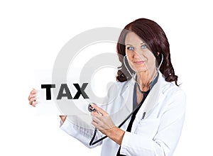 Female doctor listening with stethoscope tax sign