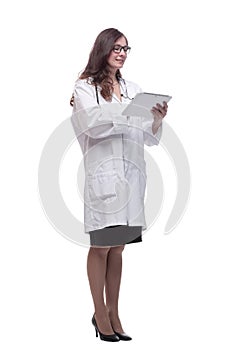 Female doctor looking at a digital tablet screen