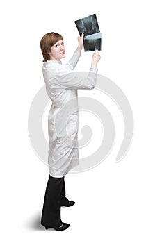 Female doctor looking at an x-ray