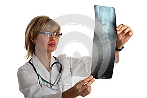 Female doctor looking at an x-ray