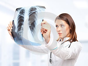 Female doctor looking at the x-ray