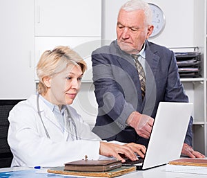Female doctor with male client