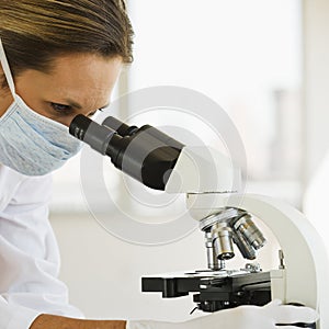 Female Doctor with Microscope