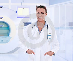 Female doctor in MRI room at hospital