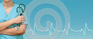 Female doctor or nurse with a stethoscope in the hands and ecg line on medical green background. Health care banner photo