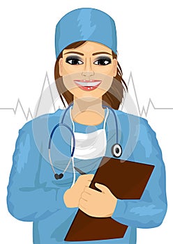 Female doctor or nurse with stethoscope taking notes