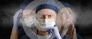 Female Doctor or Nurse Wearing PPE Crying, Praying and Facing Forward photo