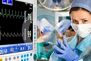 Female doctor in operation room photo