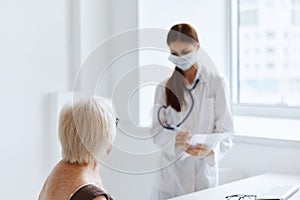 female doctor patient examination health care