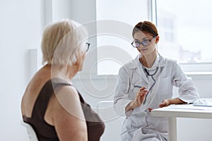 female doctor patient examination health diagnostics