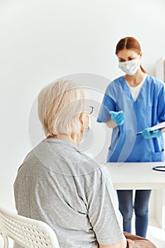 female doctor patient examination medical masks