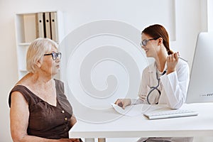 female doctor patient examination professional advice