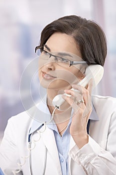 Female doctor on the phone