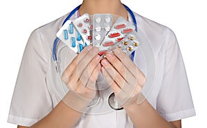 Female doctor with pill holding hand, isolated on white background