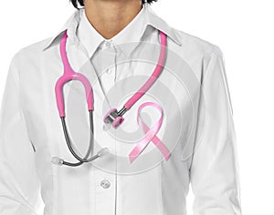 Female doctor with pink ribbon and stethoscope on white background, closeup.