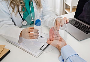 Female doctor prescribing medication to patient