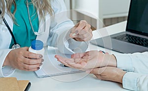 Female doctor prescribing medication to patient