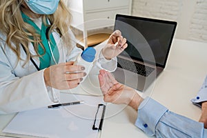 Female doctor prescribing medication to patient