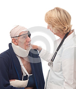 Female doctor reassuring senior patient