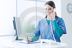 Female doctor at the reception desk