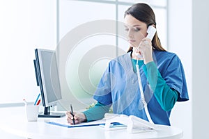 Female doctor at the reception desk